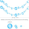 A string of blue glass bubbles, flat and three-dimensional looking, used for a geometric shark birthday banner or hanging gar