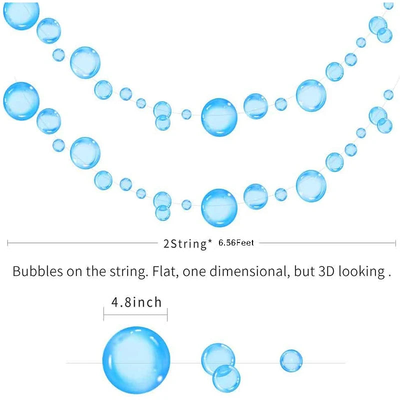 A string of blue glass bubbles, flat and three-dimensional looking, used for a geometric shark birthday banner or hanging gar