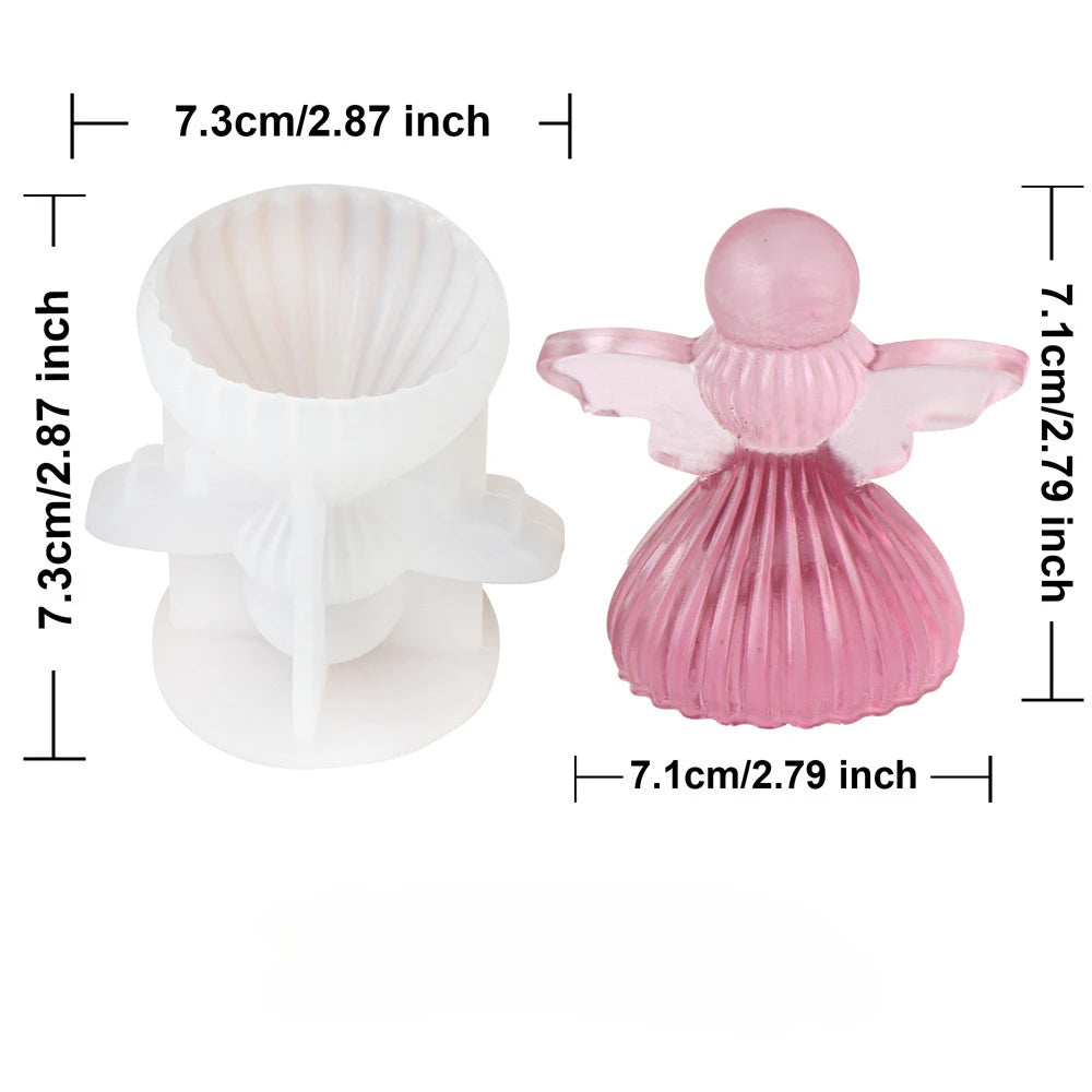 Pink silicone mold shaped like a cherub angel for making candles and soap