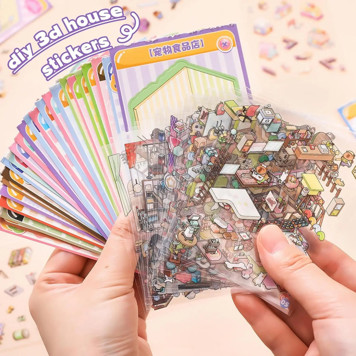 Hands hold a stack of DIY 3D house stickers and a colorful card featuring a house design.