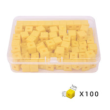 A clear plastic container filled with 100 yellow linking cubes for early math learning.