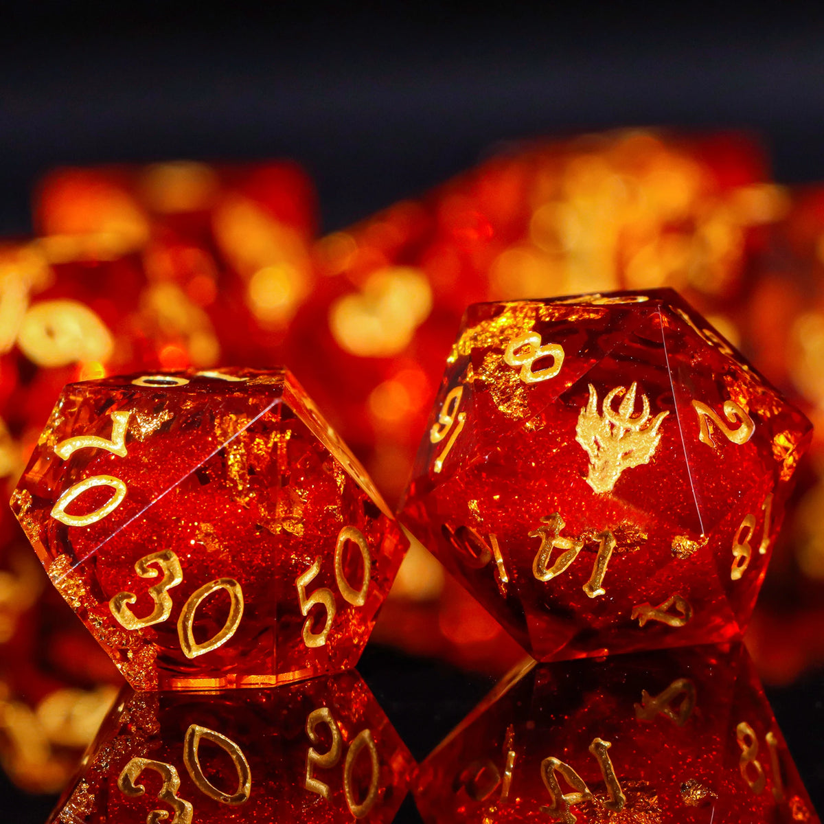 A close-up of several translucent red resin dice reflecting light on a dark surface.
