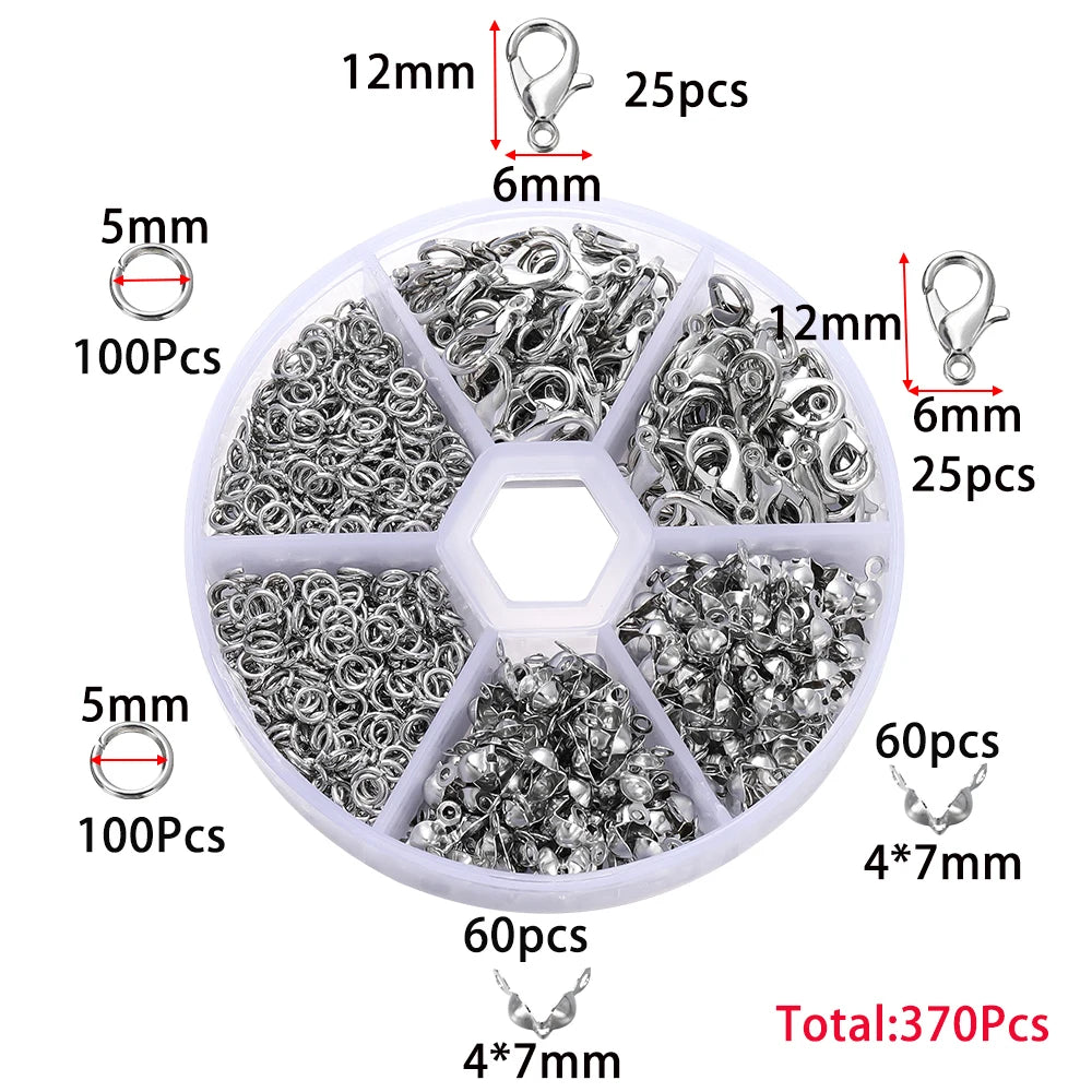 A circular plastic kit containing various jewelry findings including lobster clasps, jump rings, and crimps.