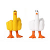 A resin figurine of a goose with a funny middle finger gesture, colored yellow and white.