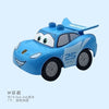A blue die-cast toy car resembling a city vehicle is shown against a light blue background.