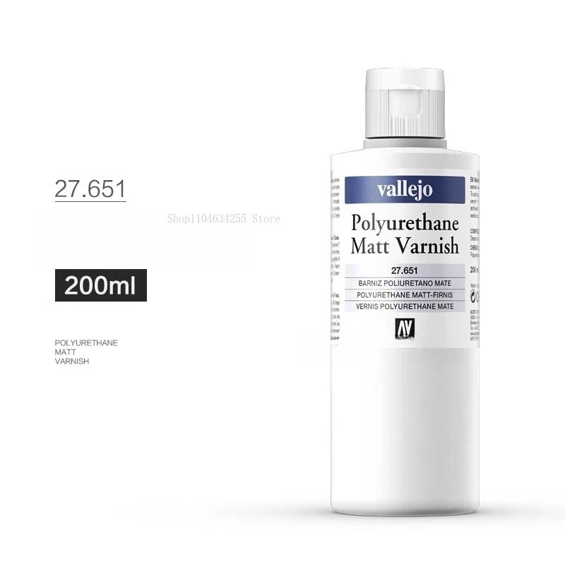A white bottle of Vallejo Polyurethane Matt Varnish with a white label and black cap.