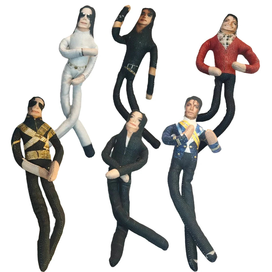 A collection of poseable plush dolls resembling Michael Jackson in various outfits and poses.
