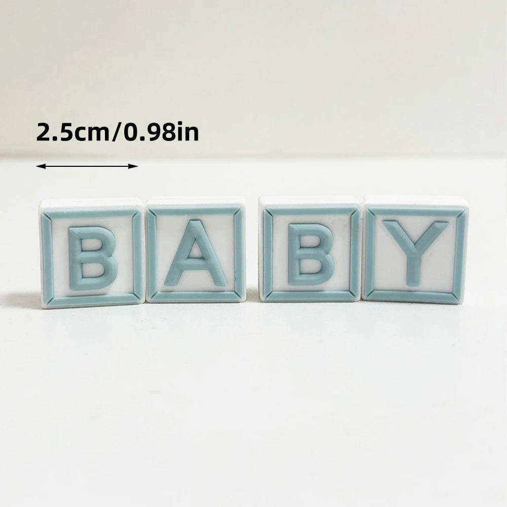A set of wooden baby alphabet letters B A B Y in light blue color with a measurement indicator.