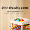 A wooden stick drawing game box filled with colorful counting sticks and balance toys for children's leisure time.