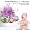 A purple plush unicorn hanging rattle toy is shown next to a baby, illustrating a crisp wind chime for soothing baby's crying