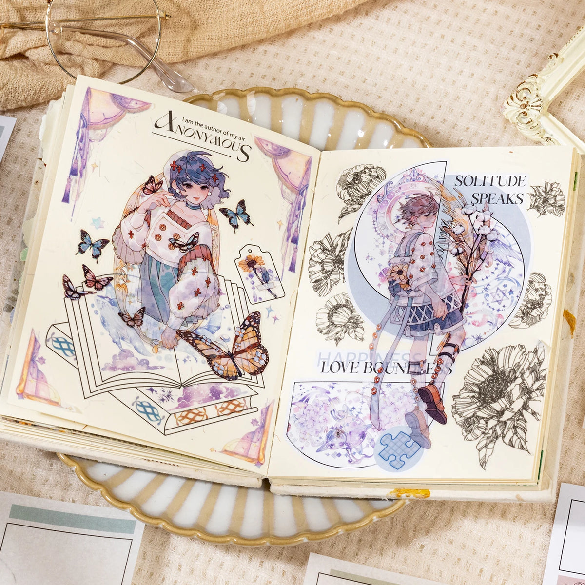 An open book featuring illustrations and text on a decorative frame with gold accents.