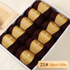 A box of Merino wool yarn balls with yellow labels showing 21# size, containing 10 pieces totaling 500g.
