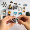 A hand holds a wooden miniature model kit puzzle bookend featuring planetary era scenes and an LED light.