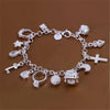 Silver Tone Crystal Charm Bracelet with Thirteen Pendants