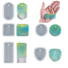 A set of silicone molds for making epoxy resin jewelry, including various shapes and colors.