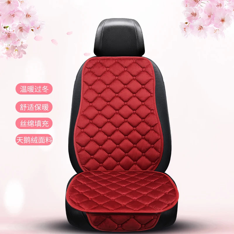 A maroon quilted car seat cushion set with black trim and a headrest, shown against a white background.