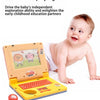 A baby is interacting with a yellow toddler learning laptop toy featuring a keyboard and colorful graphics.