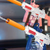 A toy gun with an orange water blaster and a pink rifle is shown firing water at a blue sphere.