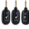 A set of black A8 wireless guitar sound transmitter and receiver units with gold connectors.