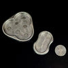 A set of metal magnetic fidget sliders showing various patterns and textures for stress relief.