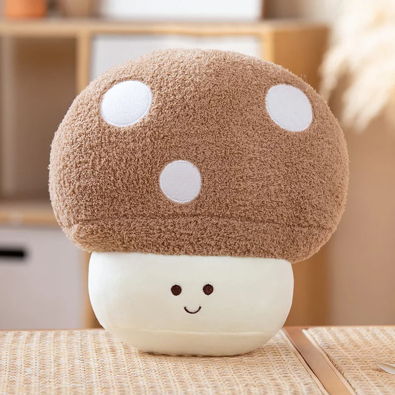 A cute, brown mushroom plush toy with white polka dots and a light beige base.