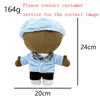 A plush doll resembling Eminem, XXXTentacion & Frank Ocean with blue fur and black clothing.