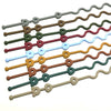 A set of silicone pacifier clips with anti-drop chains in various colors and shapes.