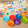 A collection of double-sided number recognition cards and colored wooden clip beads for Montessori learning.