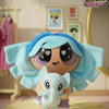 A plush collectible figure of Blossom from The Powerpuff Girls, featuring light blue hair and a small white animal accessory.