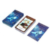 A deck of Spanish Angel Oracle cards featuring blue and gold designs with angelic imagery.