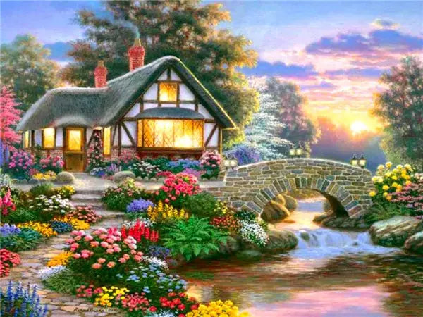 A picturesque forest house with a stone bridge over a stream surrounded by colorful flowers at sunset.