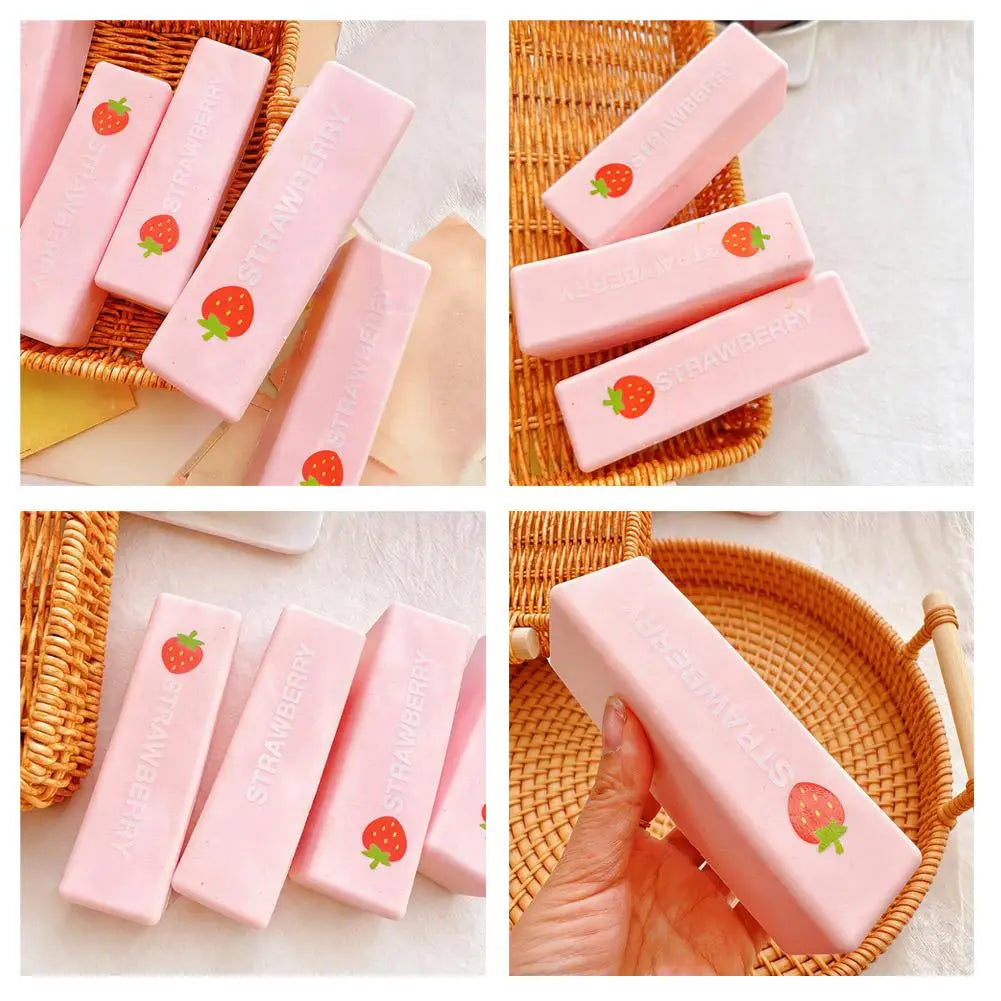 Pink strawberry milk squishy stress relief toy in various packaging and hands
