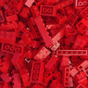 A pile of red building blocks used for creative DIY projects.