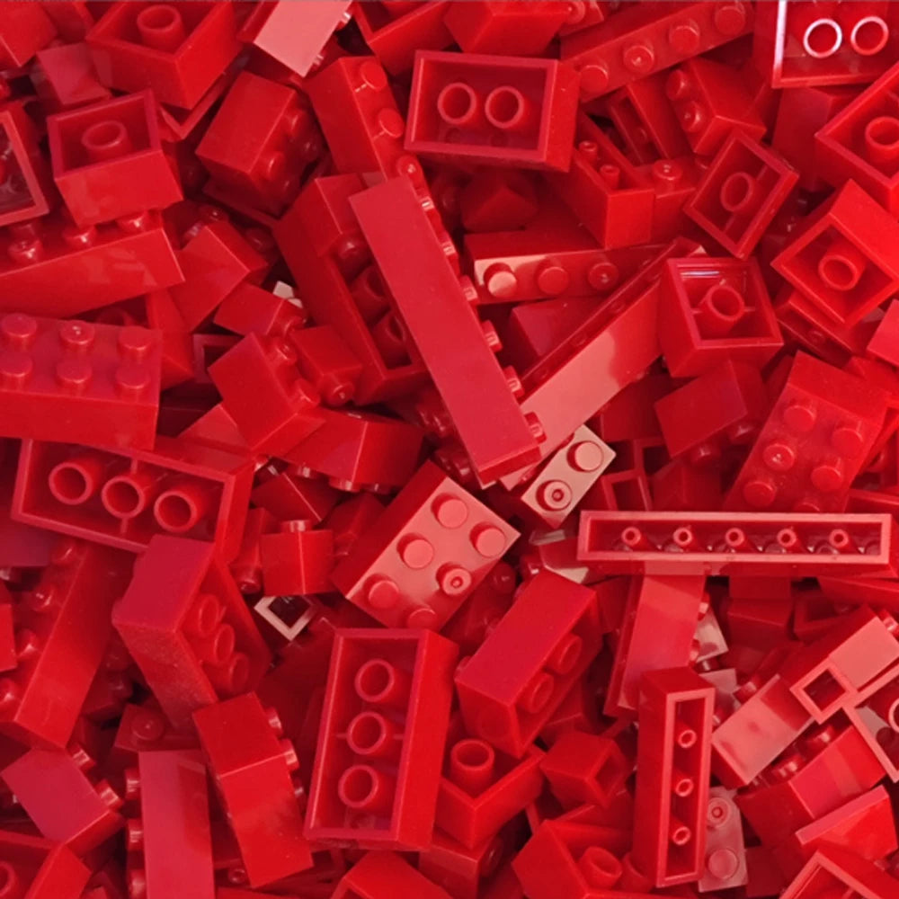 A pile of red building blocks used for creative DIY projects.