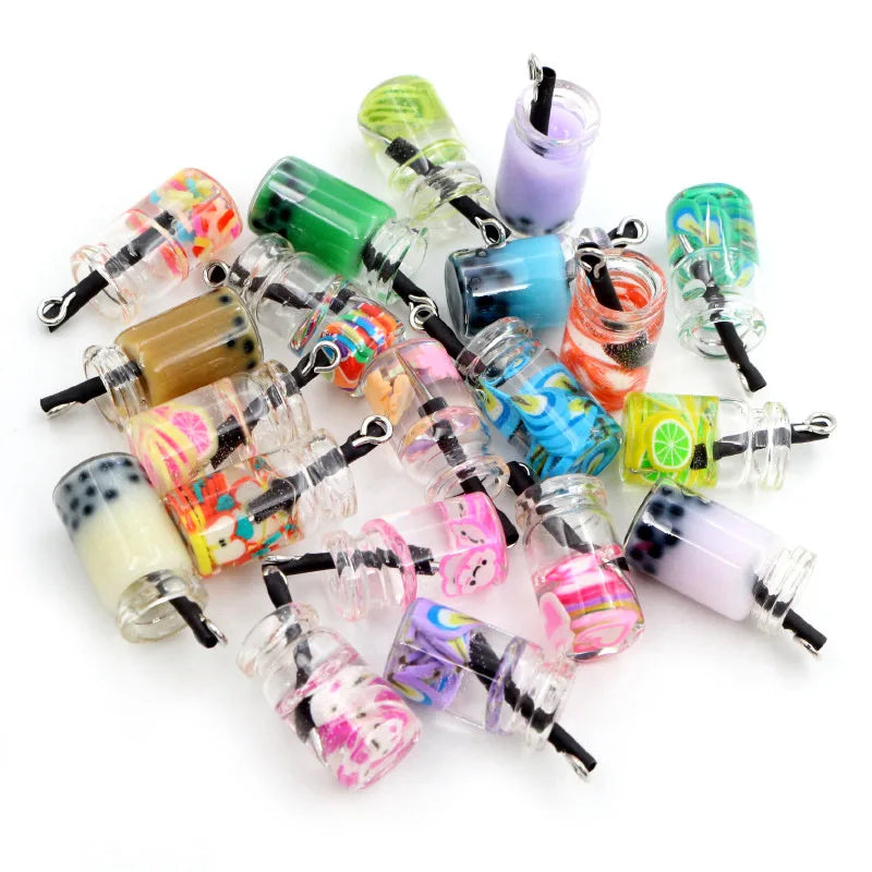 A collection of 20 assorted resin fruit and drink charms in various colors and shapes for jewelry making