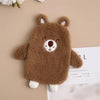 A brown plush toy resembling a bear is shown against a light background.
