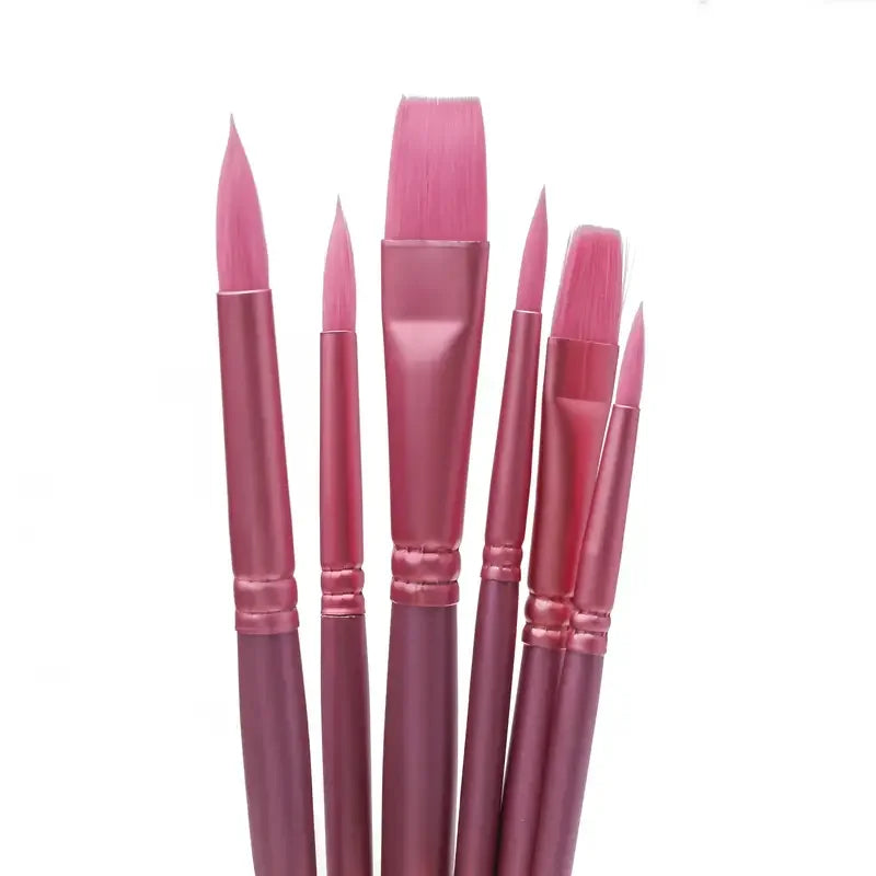 A set of six pink nylon paint brushes for watercolor and acrylic painting