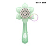 A light green sunflower-shaped electric bubble blower toy with a perforated head and a clear ring.