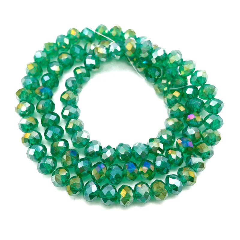Green faceted crystal beads strung together for jewelry making