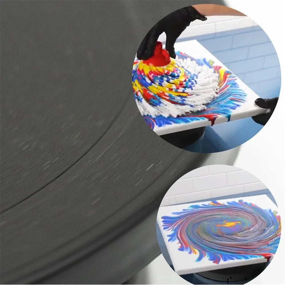 A hand is decorating a cake with colorful frosting using a rotating turntable and tools from a cake decorating kit.