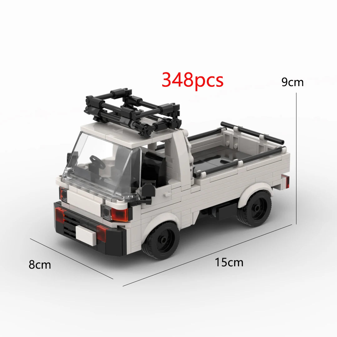 A white LEGO-style building block model of a pickup truck with a cab and open bed, shown from the side.