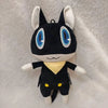 A black and white plush doll resembling the character Morgana from Persona 5