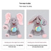 Deux façons de jouer avec le jouet ours éléphant pour tout-petits, montrant la pression du pied et l'option bascule de main.