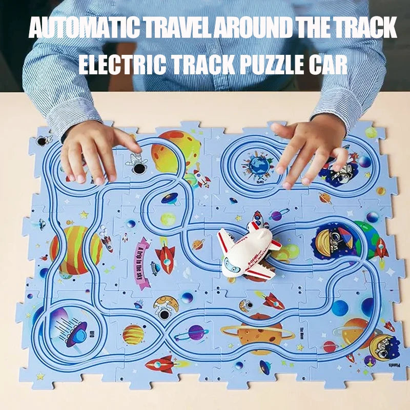 A child's hands are assembling a puzzle car made of interlocking plastic pieces that form an electric track.
