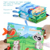 A colorful cloth book featuring illustrations of various animals like a bird, raccoon, and other creatures.