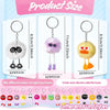 Eight different colored plush animal keychains in various fun styles for party favors and rewards