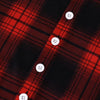 Close-up of a red and black plaid fleece-lined hooded two-piece set with white buttons.