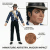 High-definition sculpted head of a miniature artistry collectible featuring intricate sequin work and US cent scale.