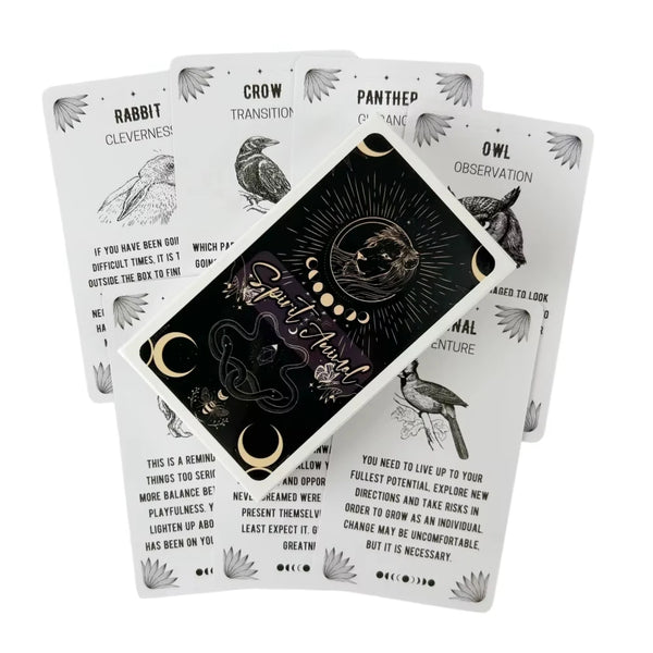 Wild Spirit Oracle-Karten mit Illustrationen von Tieren wie Kaninchen, Krähen und Eulen.