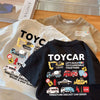 A black crew neck t-shirt featuring a design of various miniature diecast toy cars.